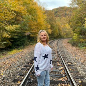 STAR PRINTED KNIT DISTRESSED SWEATER